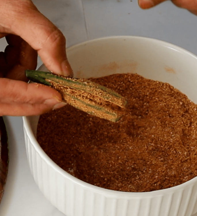 Step 3.1: Using a small spoon or your fingers, gently fill each bhindi with the prepared masala mix