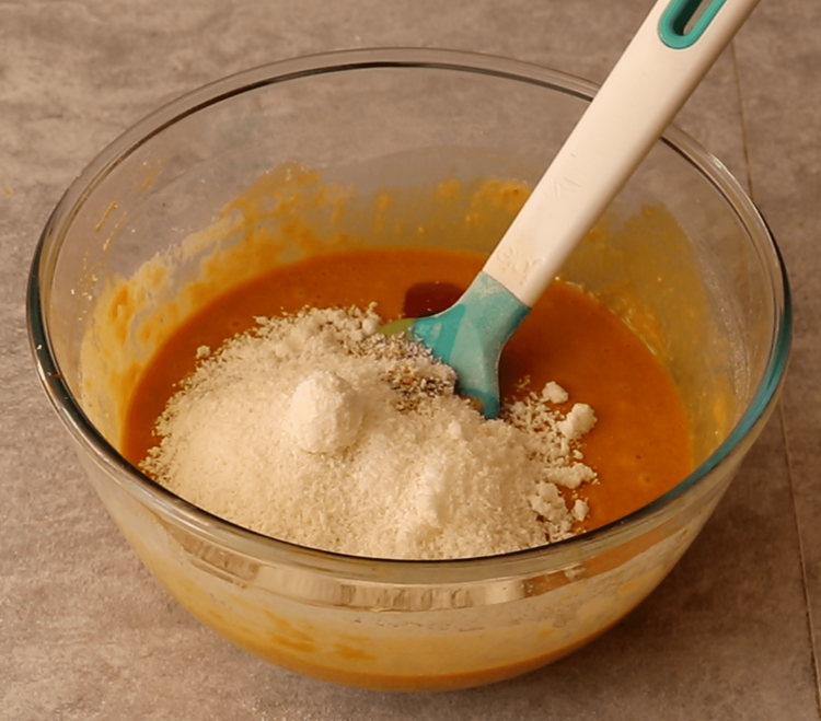 Step 1.1: Fold in the desiccated coconut and vanilla essence