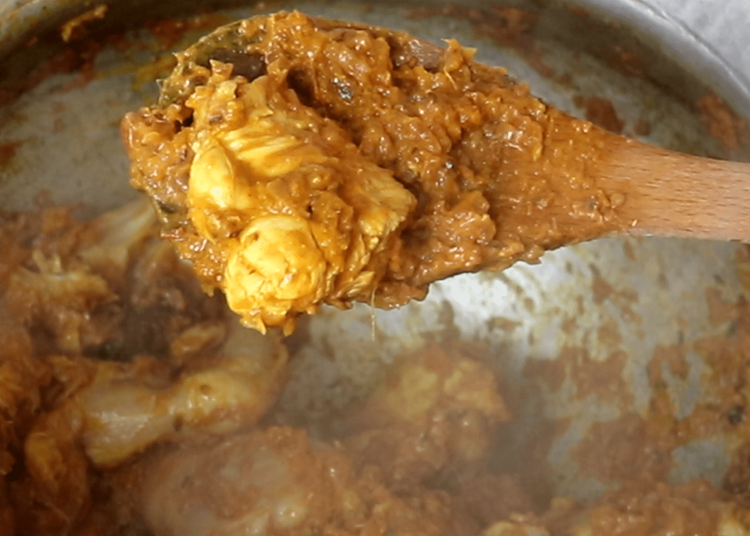 Step 3.2: Add chicken pieces and sauté for 5–6 minutes until they change colour and are well coated with masala