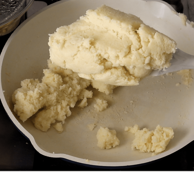 Step 2.2: Cook until the mixture thickens and leaves the sides of the pan, forming a dough-like texture
