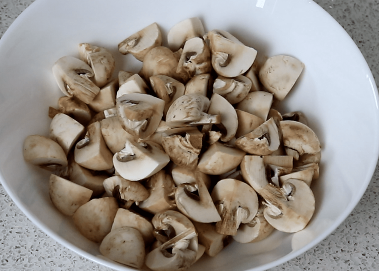 Step 1.1: Wash, pat dry, and cut the mushrooms in halves or quarters