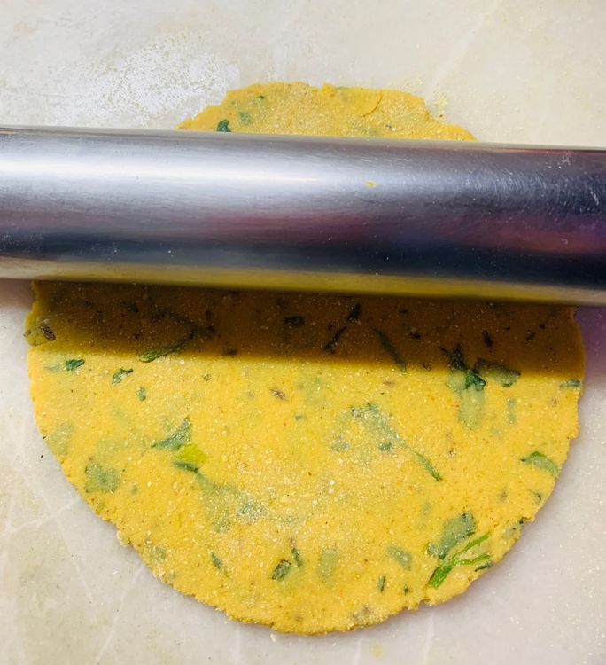 Step 2.1: Flatten the dough ball lightly with your palms