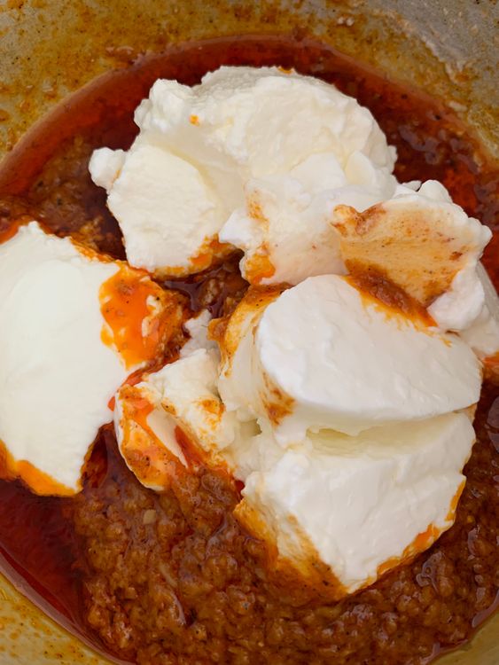 Step 2.1: Add cinnamon powder, salt, black pepper and yogurt/curd to the bowl