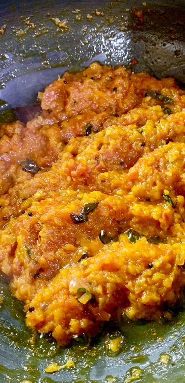 Step 2.1: Add tomatoes, turmeric and salt and cook until tomatoes are soft and the oil starts to separate