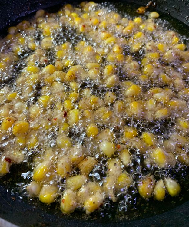 Step 1.1: Cook the corn kernels until they are golden brown and crispy, about 5-6 minutes
