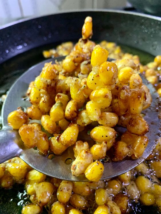 Step 1.2: Cook the corn kernels until they are golden brown and crispy, about 5-6 minutes