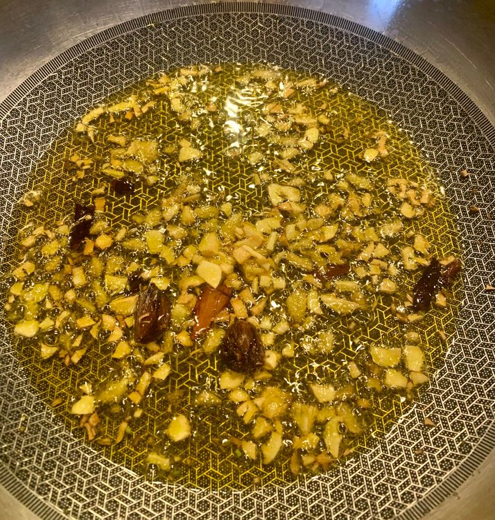 Step 1.1: Add black cardamom, cinnamon, cloves, chopped ginger and garlic