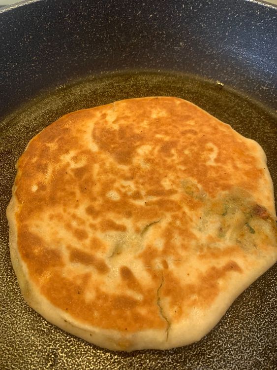Step 5.3: Brush the naan with little oil on both sides