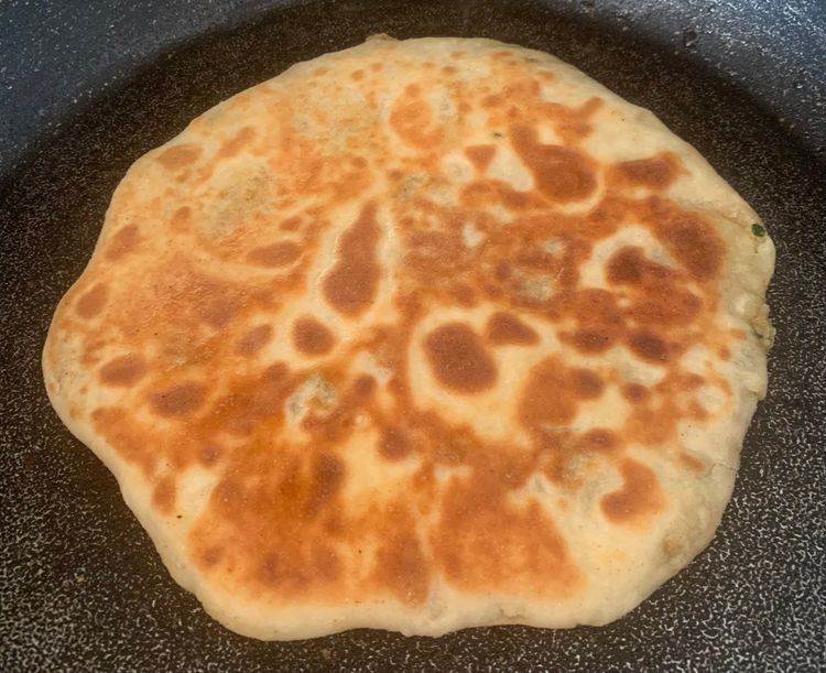 Step 5.2: Brush the naan with little oil on both sides