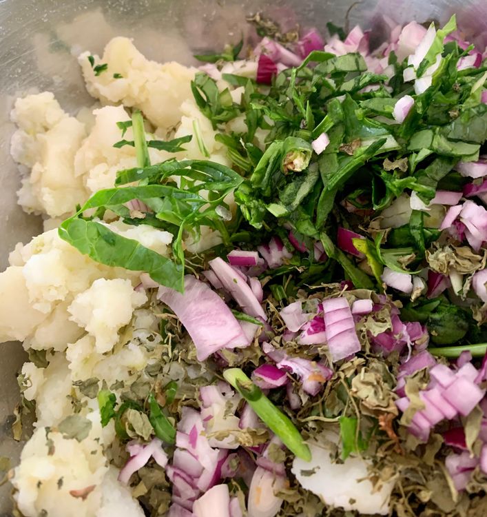 Step 1.1: Add chopped spinach, onions, green chillies, ginger, red chilli powder, red chilli flakes, coriander powder, cumin powder, mango powder, garam masala, carom seeds, fenugreek leaves, coriander leaves and salt