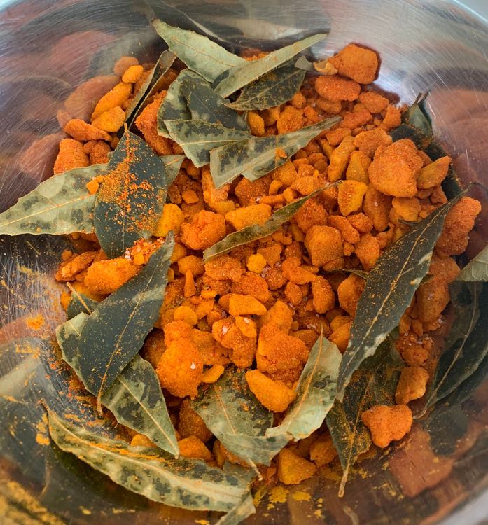Step 1.2: Mix turmeric powder, kashmiri red chilli powder, garam masala, jaggery, salt, and curry leaves in a large mixing bowl