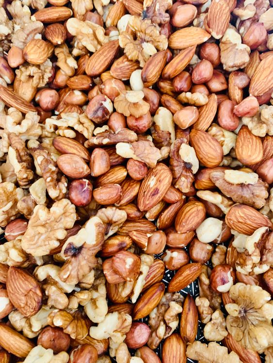 Step 1.1: Add the peanuts and roast them for 2 minutes