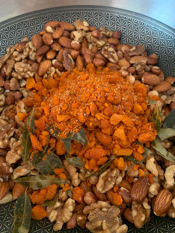 Step 1.1: Add the prepared spice and jaggery mix to the skillet
