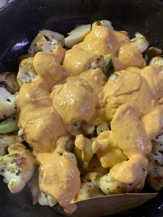 Step 3.1: Reduce the heat from low to medium heat and add the curd mixture to the pan