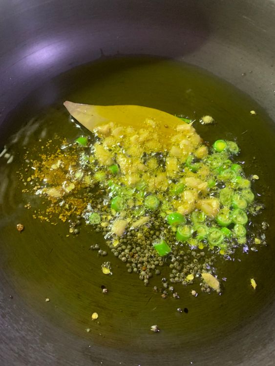 Step 3.2: Add asafoetida, mustard seeds, and bay leaf