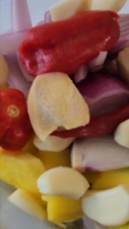 Step 1.1: Combine mango, coconut milk, red onion, garlic, ginger, habanero chillies, lemon juice, oregano, salt, and pepper in a blender