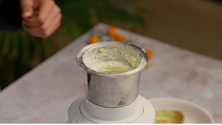 Step 3.1: Gradually drizzle in the extra-virgin olive oil while blending on high speed until the mixture becomes smooth, creamy, and light