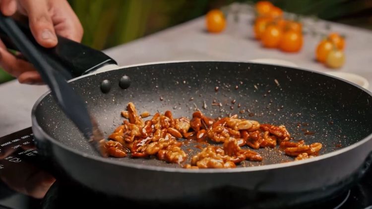 Step 1.1: Heat a saucepan over medium heat and dry roast the [mixed nuts](https://www