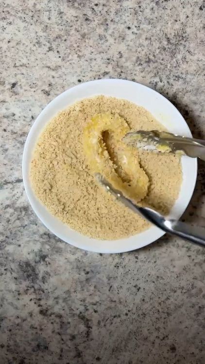 Step 1.1: Dredge the calamari in the seasoned flour mixture, shaking off any excess