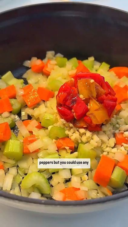 Step 1.1: Add the soaked beans, diced tomatoes, vegetable broth, cumin, paprika, salt, and pepper to the pot