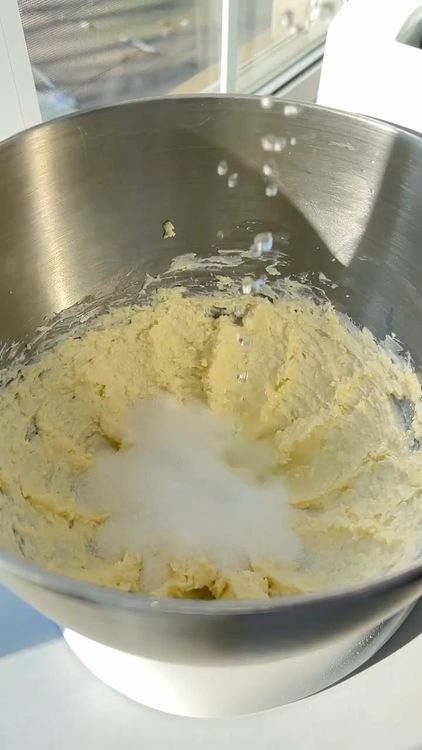 Step 1.1: Add the sugar and lemon extract, then mix again until well combined