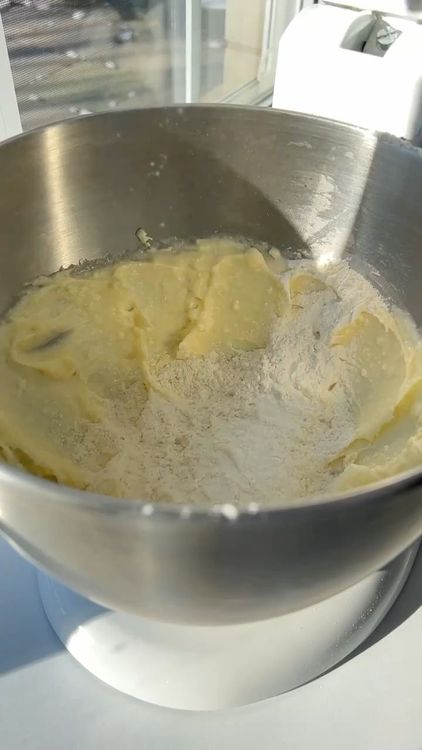 Step 1.1: Gradually add the flour and mix until a dough forms