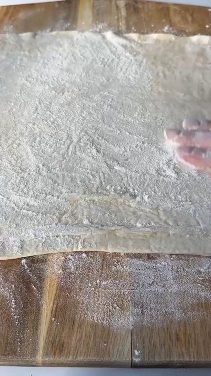 Step 1.1: Lightly flour a surface and roll out the puff pastry