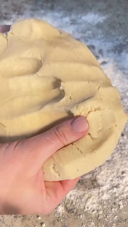 Step 1.1: On a lightly floured surface, knead the dough a few times