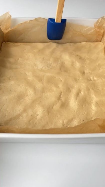 Step 1.1: Press the dough evenly into a baking sheet or mold