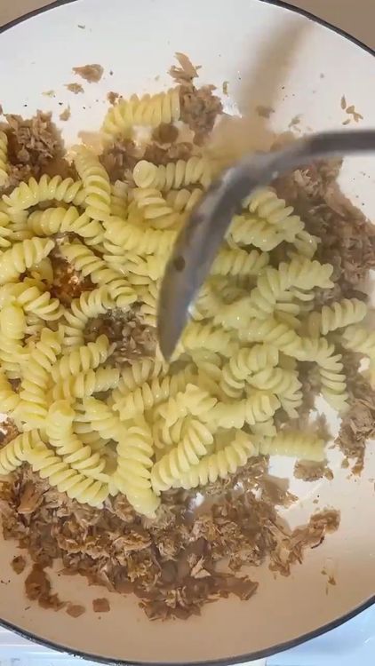Step 1.1: Drain the pasta and add it to the skillet with the tuna