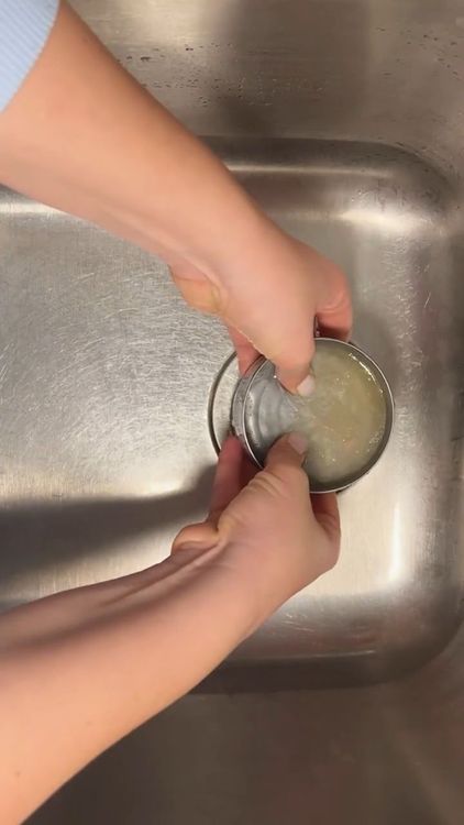 Step 1.1: Drain the liquid from the tuna and add it to the skillet