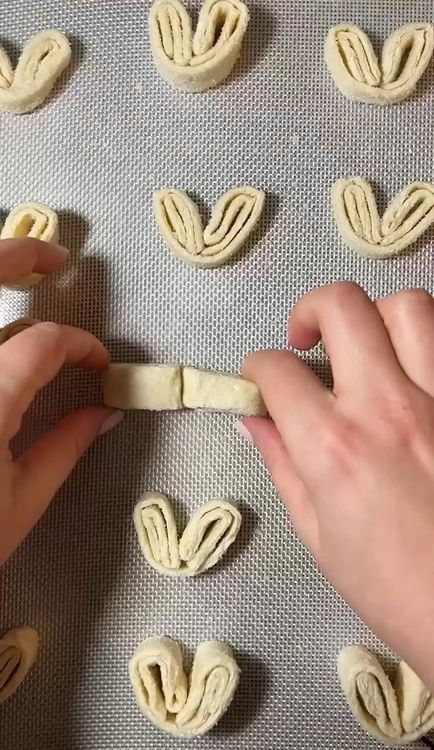 Step 1.1: Fold each piece into a heart shape and pinch the middle together