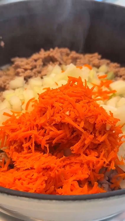 Step 1.1: Add onions, carrots, and garlic