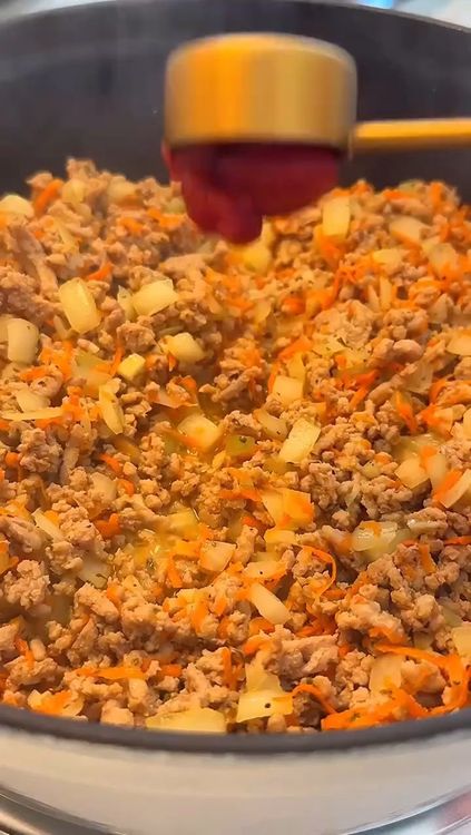 Step 1.2: Add spices, tomato paste, tomato sauce, and rinsed rice