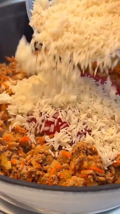 Step 1.1: Add spices, tomato paste, tomato sauce, and rinsed rice
