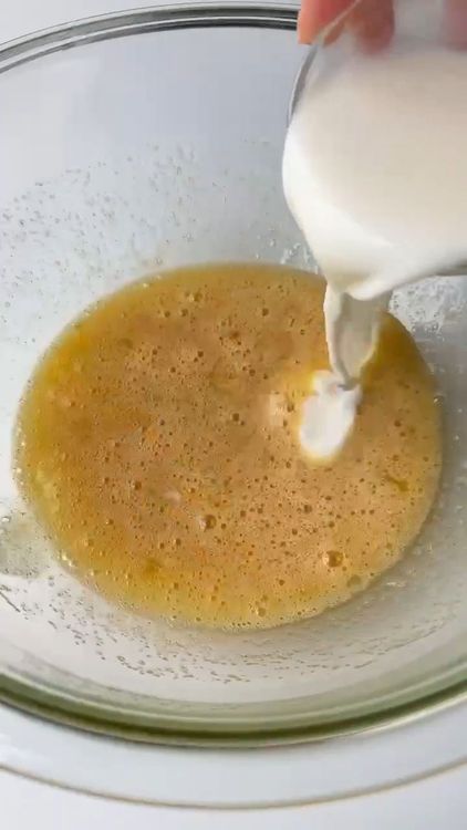 Step 1.1: Add milk and oil to the mixture and stir