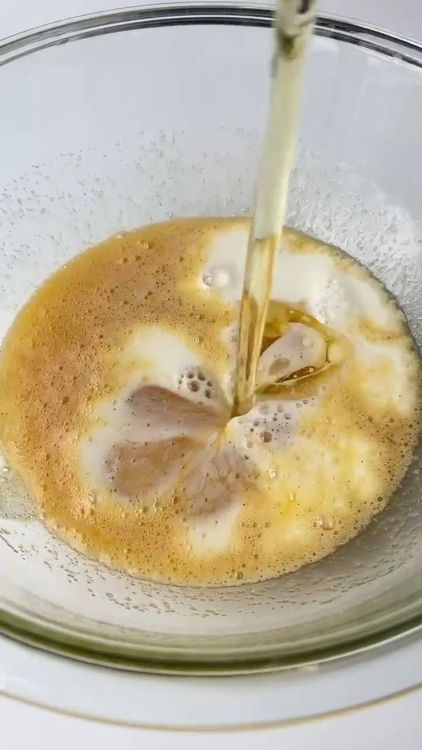 Step 1.2: Add milk and oil to the mixture and stir