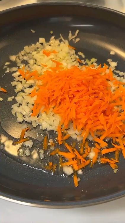 Step 2.1: Sauté onions, grated carrot, and garlic in a pan