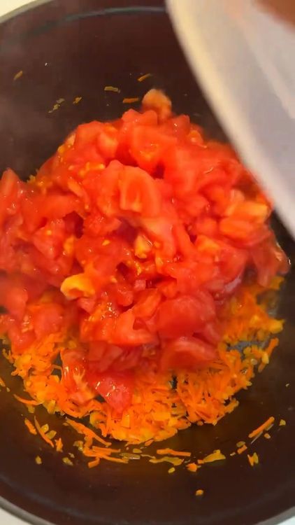 Step 1.1: Add garlic, chopped tomatoes, and salt to the pot