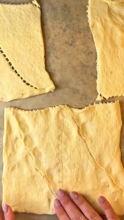 Step 1.1: Unroll the crescent roll dough and press the perforations to seal them together