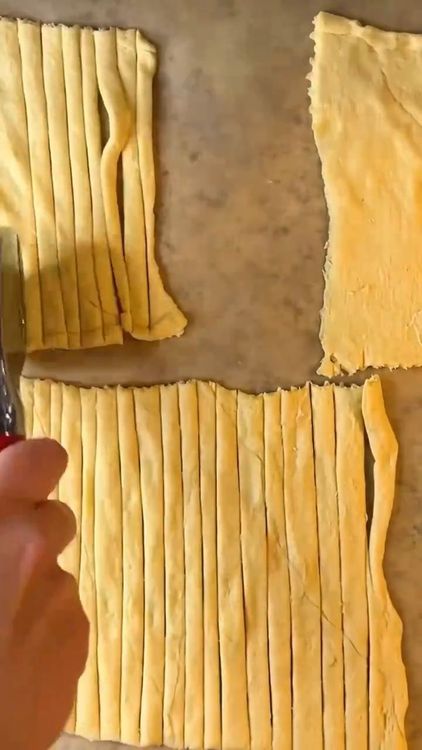 Step 1.1: Use a pizza cutter to cut the dough into thin strips