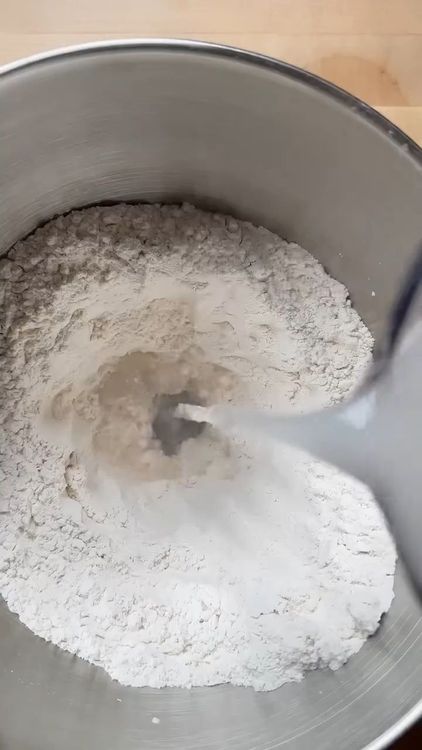 Step 1.1: Combine flour, salt, water, and olive oil in a stand mixer or by hand until you have a smooth dough