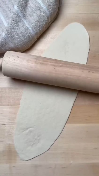 Step 3.1: Roll out the dough thinly into long oval shapes