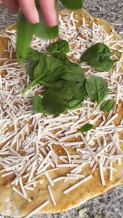 Step 2.1: Layer mozzarella cheese, fresh spinach, and chopped tomatoes on top
