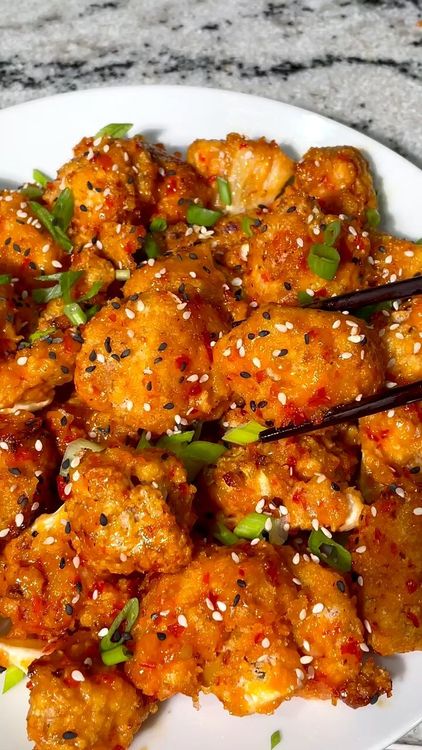 Step 1.1: Garnish with chopped green onions and sesame seeds before serving
