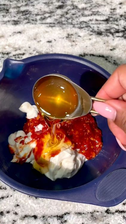 Step 1.1: In a small bowl, mix together the hot sauce, mayonnaise, and honey to create the Bang Bang sauce
