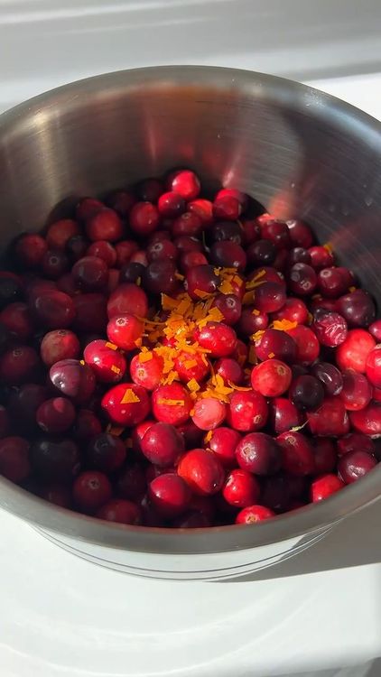 Step 1.1: Combine fresh cranberries, orange juice, maple syrup, and water in a pot