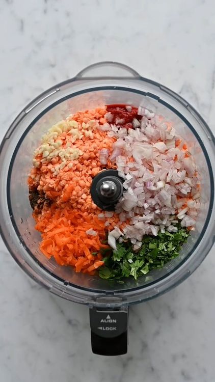 Step 1.1: In a large bowl, combine the cooked lentils, grated carrots, tomato paste, chopped cilantro or parsley, garlic, and shallots