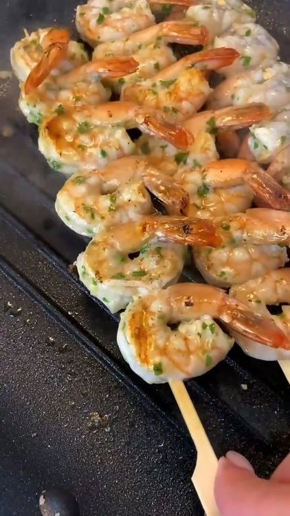 Step 1.2: Cook the shrimp skewers on the barbecue for about 15 minutes, turning occasionally until the shrimp are opaque and cooked through