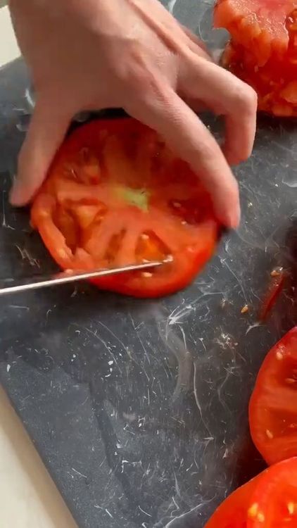 Step 1.1: Cut the extra large tomatoes into thick slices